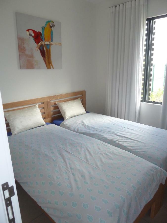 Swiss Nest Travel Apartment Roches Noires Bagian luar foto